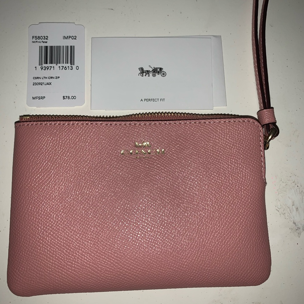 Pink coach wristlet
